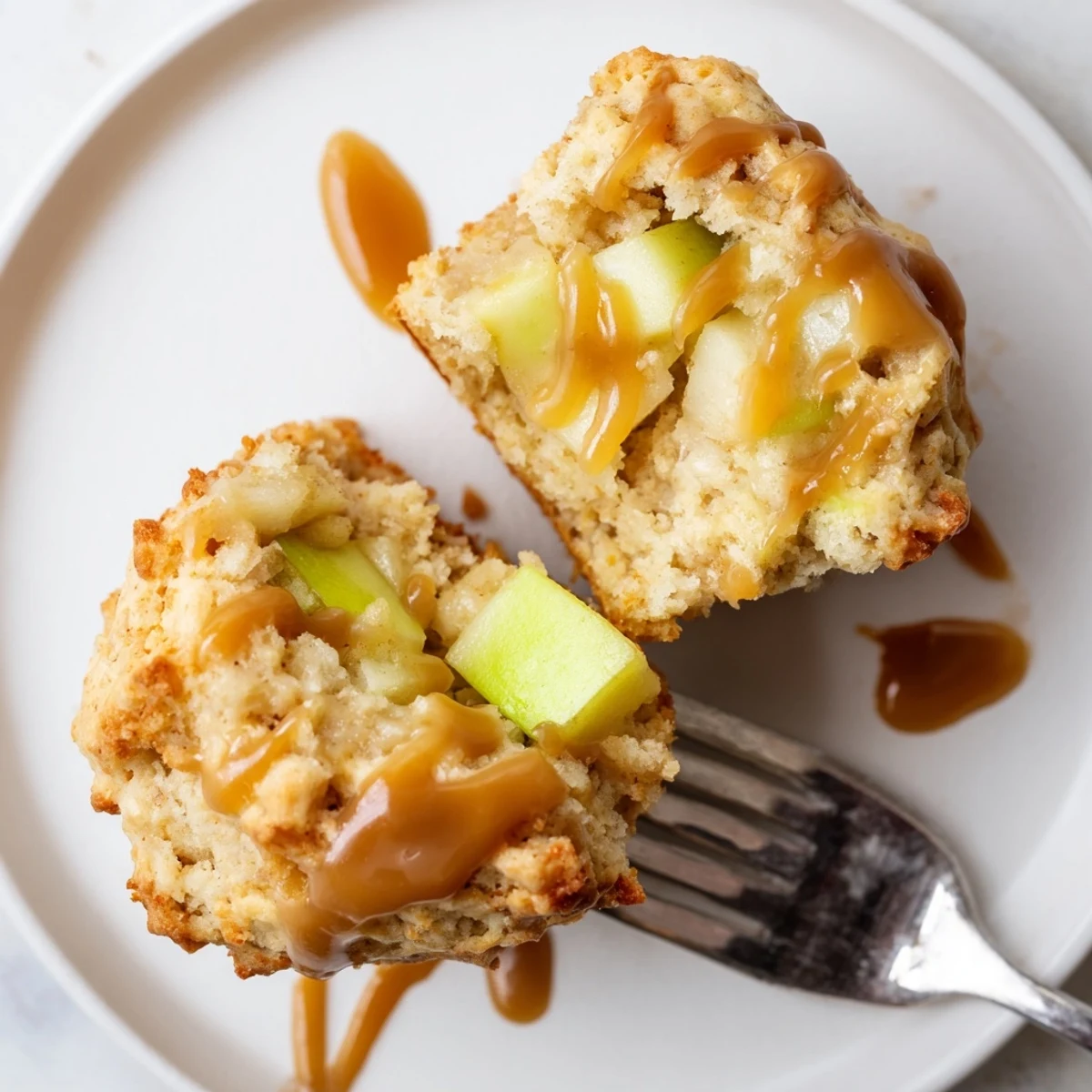 Warm, fluffy caramel apple scone muffins pair perfectly with your morning coffee.