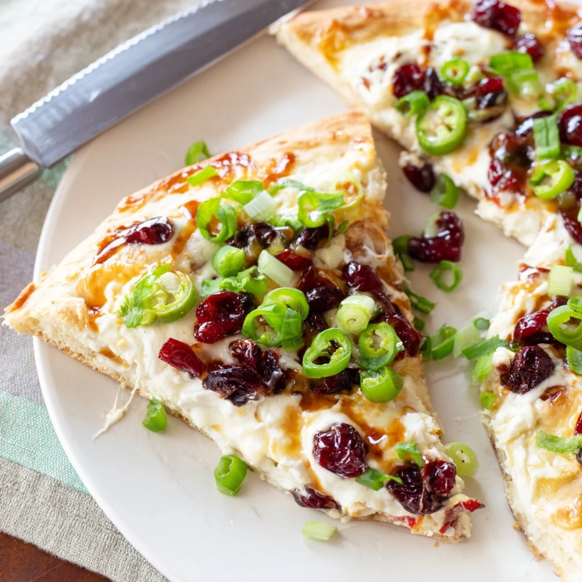 Vibrant Cranberry Jalapeño Dip Pizza with a crispy crust and zesty flavors.