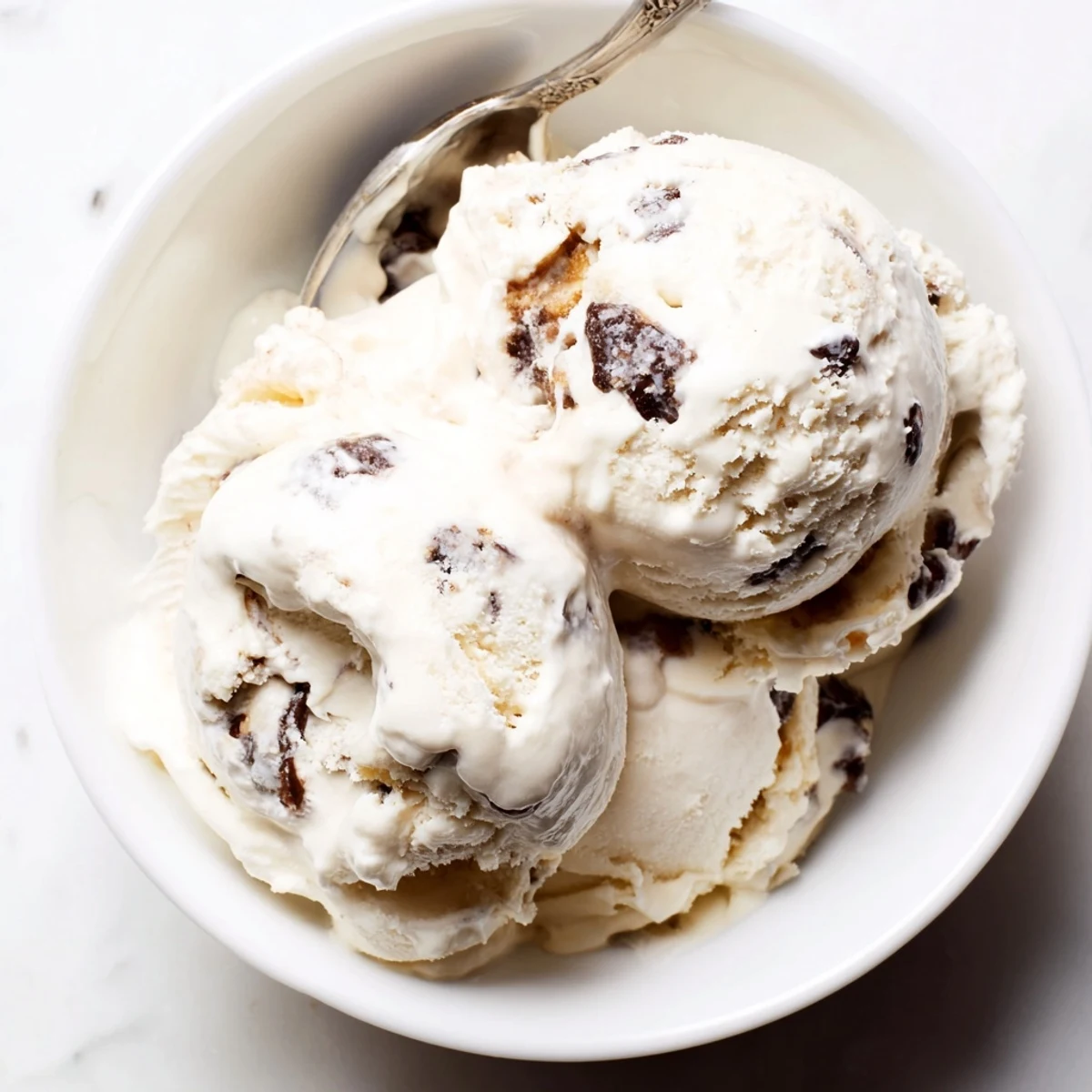 Creamy cottage cheese ice cream topped with delicious chocolate chip cookie dough bites.  