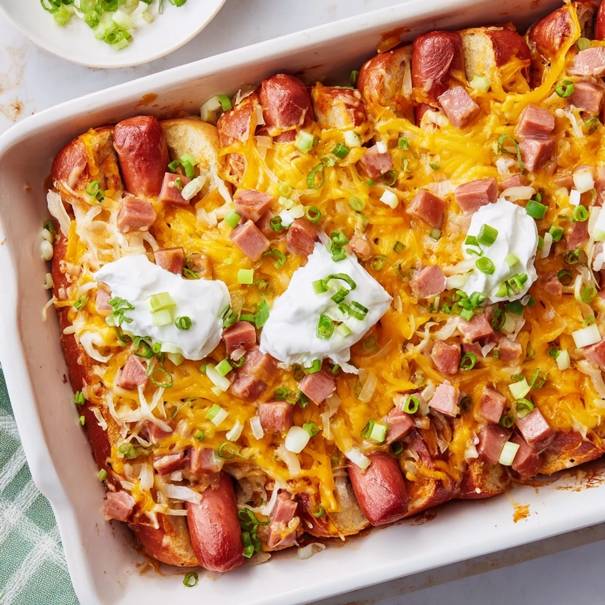 Golden, bubbly Chili Dog Casserole, a comforting baked dish with melted cheese and delicious chili.