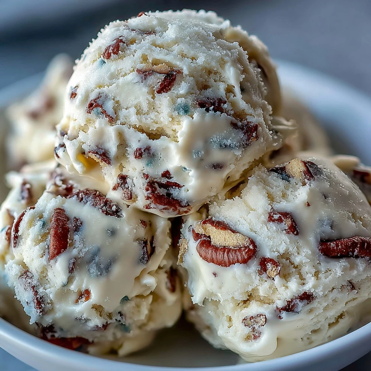 A chilled portion of Greek Yogurt Cookie Dough ready to enjoy, perfect for a rich, egg-free dessert snack.