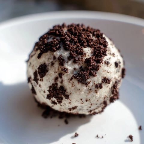 Cream Cheese Oreo Protein Balls with crushed Oreos, waiting in a bowl for the mixing.