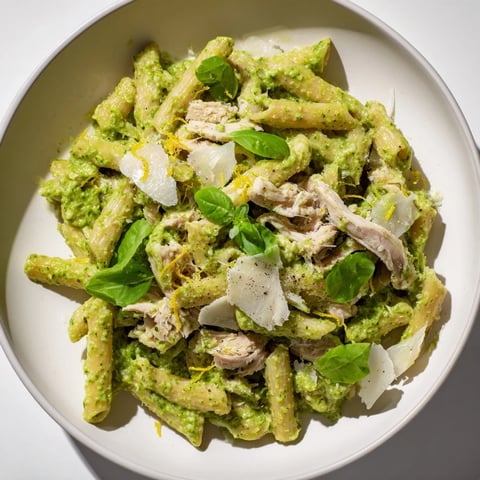 Steaming 10-Minute Pesto Pasta with Chicken: flavorful pasta tossed with chicken, fragrant pesto, and Parmesan.