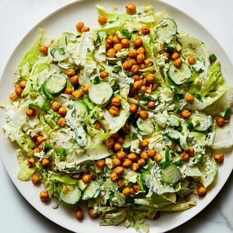 Fresh Green Goddess Salad with crispy golden chickpeas, a healthy and delightful vegetarian meal.