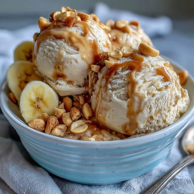 Enjoy a spoonful of rich 4-Ingredient Peanut Butter Banana Ice Cream, vegan perfection.