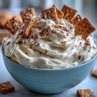 Creamy cheesecake dip with graham crackers, a dreamy dessert perfect for parties and quick snacks.